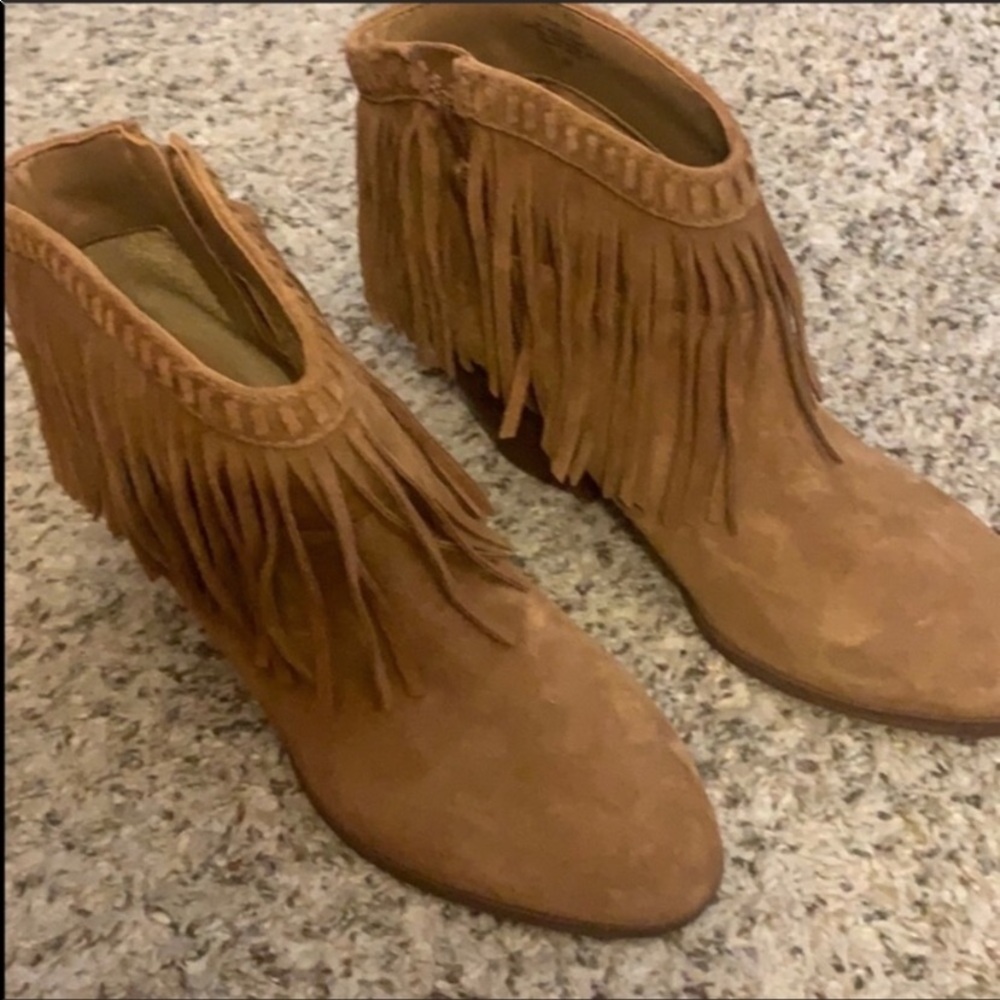 NEW.  NEW GIANNI.  BINI.